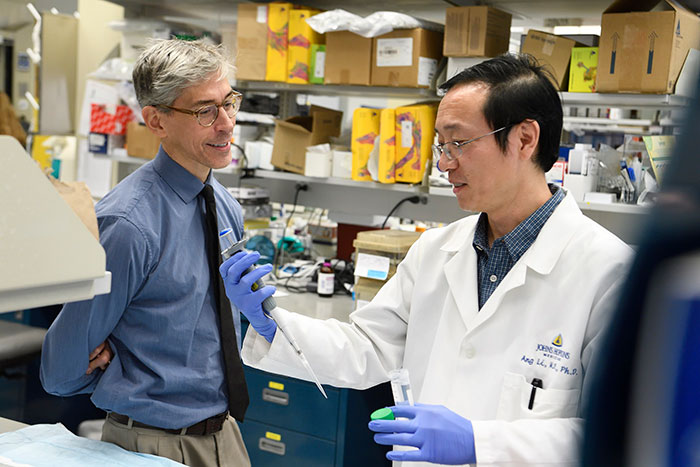 Dr. Luis Garza and colleague